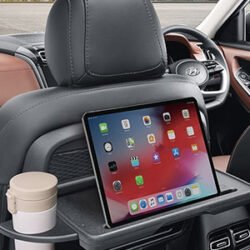 Front-row-seatback-table-with-retractable-cup-holder-and-IT-device-holder